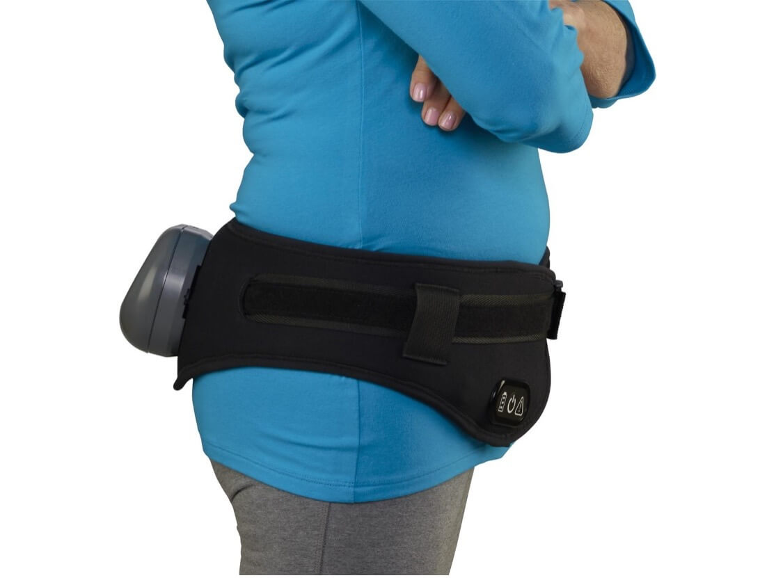 Side view of a person wearing an osteoboost belt